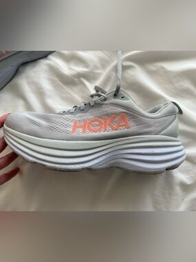 HOKA Lightweight Running Shoe in Light Gray with Pink Logo 10.5